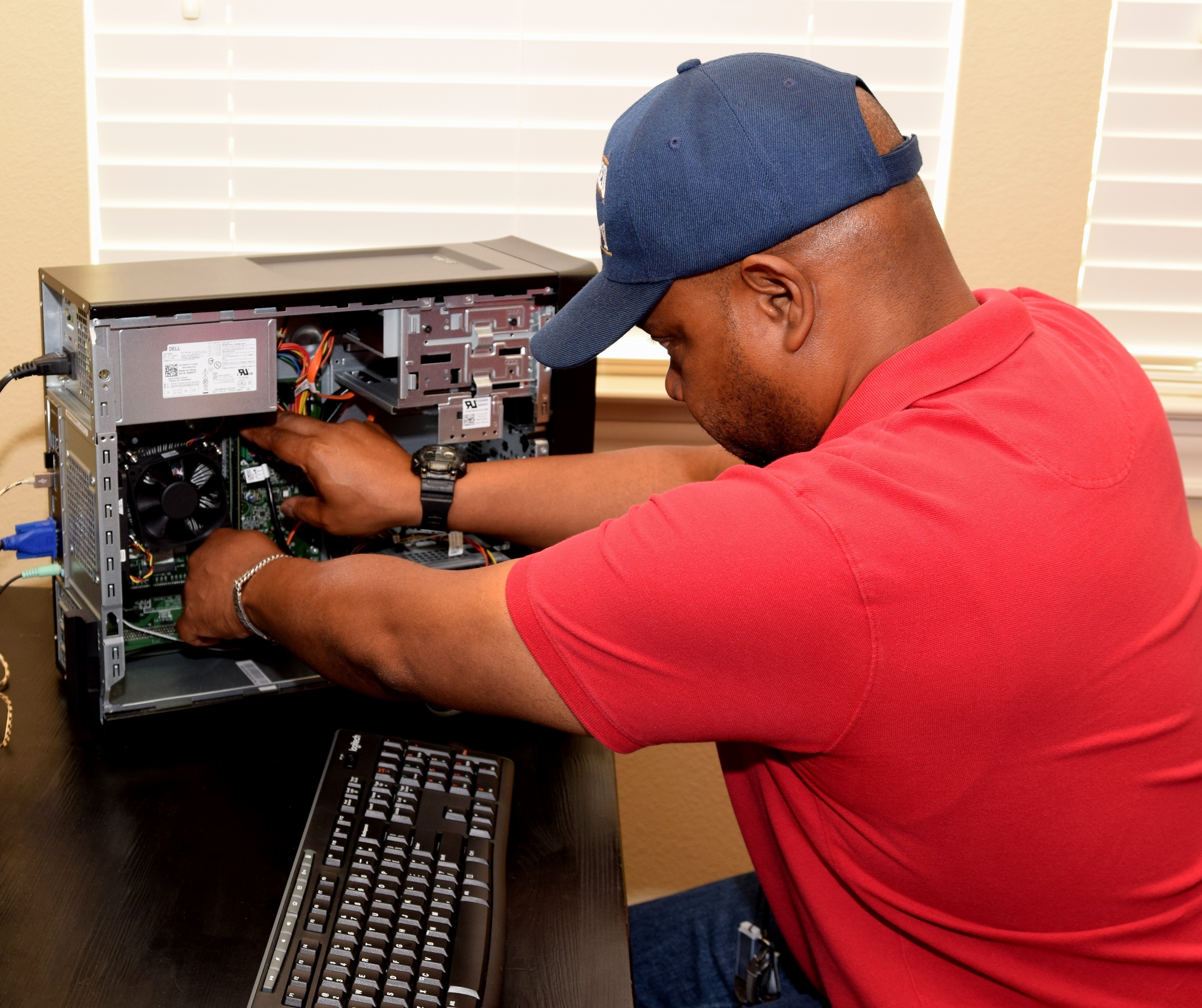 Technician working on a laptop
